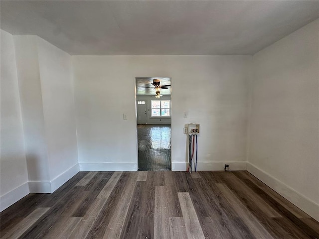 314 N Maryland Ave, Mangum, OK 73554 - empty room featuring a ceiling fan, baseboards, and wood finished floors