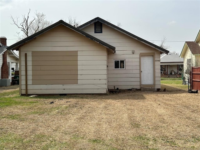 314 N Maryland Ave, Mangum, OK 73554 - rear view of house with cooling unit
