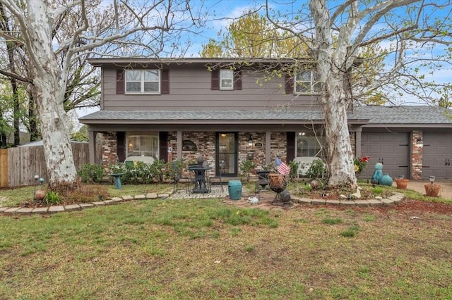 6706 N Woodward Dr, Oklahoma City, OK 73116 - traditional-style home with a garage, brick siding, and a porch