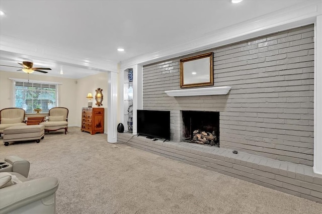 6706 N Woodward Dr, Oklahoma City, OK 73116 - living area with carpet floors, a fireplace, recessed lighting, and a ceiling fan