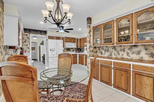 6706 N Woodward Dr, Oklahoma City, OK 73116 - dining room featuring light tile patterned floors, a chandelier, wallpapered walls, a ceiling fan, and recessed lighting