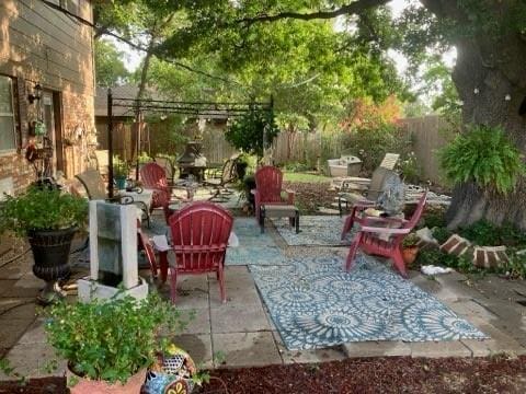 6706 N Woodward Dr, Oklahoma City, OK 73116 - view of patio featuring a fenced backyard