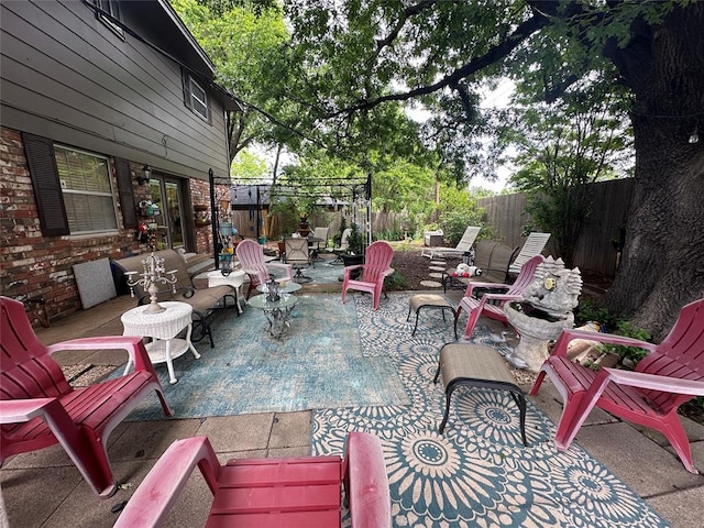 6706 N Woodward Dr, Oklahoma City, OK 73116 - view of patio with a fenced backyard and outdoor lounge area