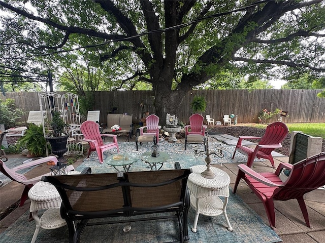 6706 N Woodward Dr, Oklahoma City, OK 73116 - view of patio featuring a fenced backyard