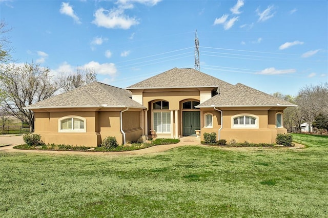 815 River View Dr, Norman, OK 73071 - view of front of house featuring a shingled roof, a front yard, and stucco siding