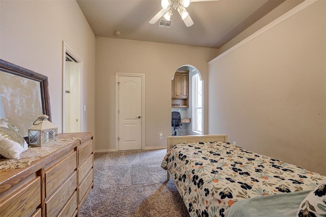 815 River View Dr, Norman, OK 73071 - carpeted bedroom with arched walkways, baseboards, ceiling fan, and visible vents