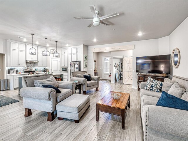 21608 SE 95th St, Mcloud, OK 74851 - living room with a ceiling fan, light wood-type flooring, recessed lighting, and baseboards