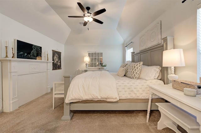 bedroom featuring visible vents, a ceiling fan, light carpet, and lofted ceiling