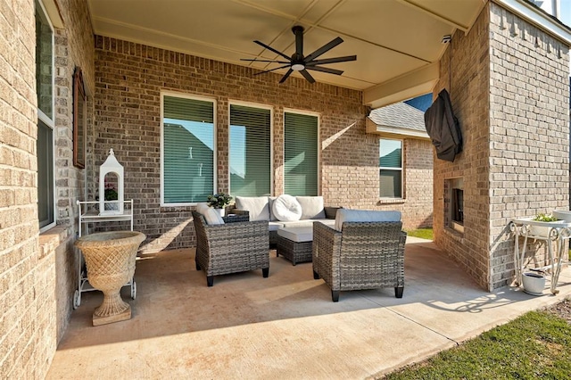 view of patio / terrace with an outdoor living space and ceiling fan