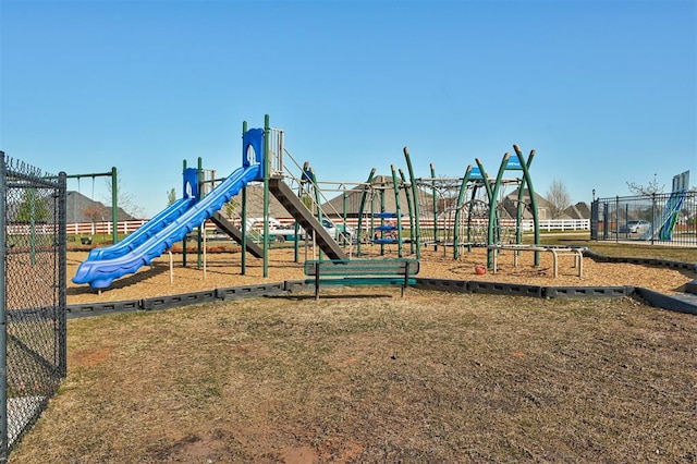 community play area featuring fence