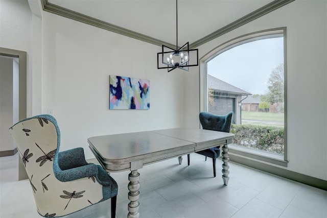 dining room featuring a notable chandelier and ornamental molding