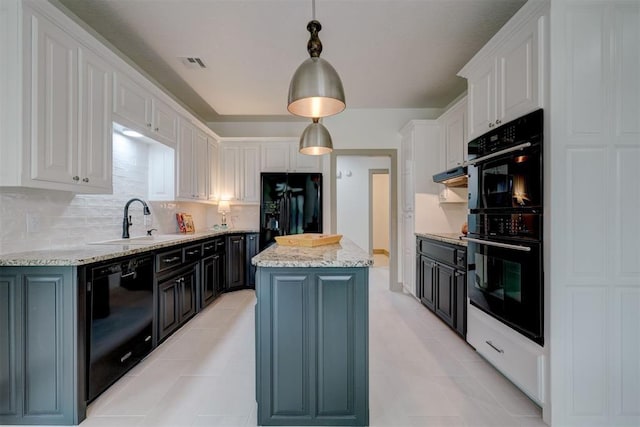 kitchen featuring a kitchen island, a sink, visible vents, white cabinets, and black appliances