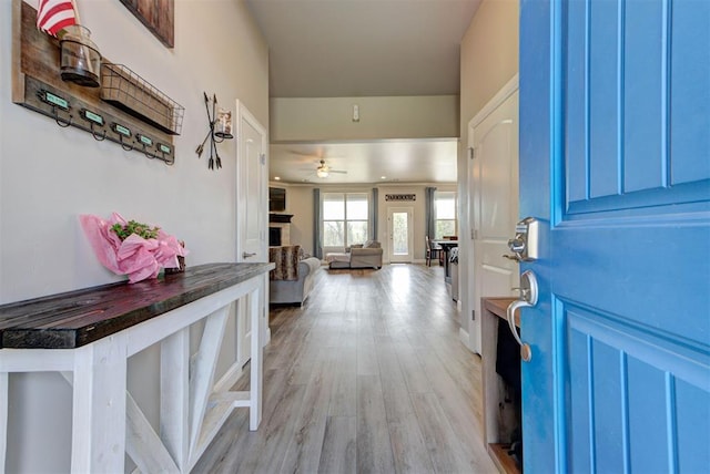 31352 Landrun Ave, Norman, OK 73072 - entrance foyer with light wood finished floors and a ceiling fan