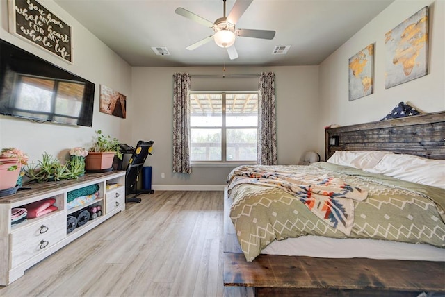31352 Landrun Ave, Norman, OK 73072 - bedroom featuring wood finished floors, baseboards, and ceiling fan