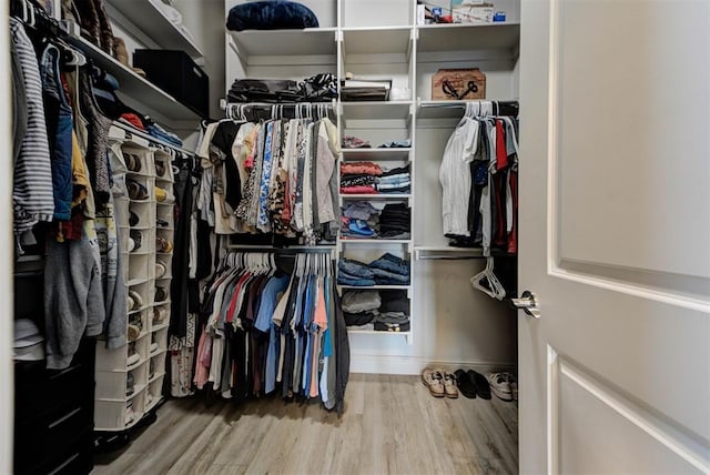 31352 Landrun Ave, Norman, OK 73072 - spacious closet featuring wood finished floors