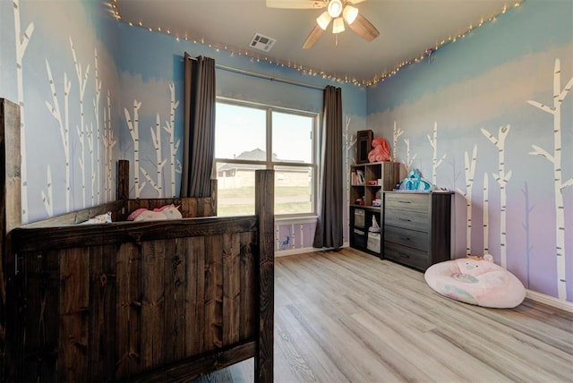 31352 Landrun Ave, Norman, OK 73072 - bedroom featuring wood finished floors and baseboards