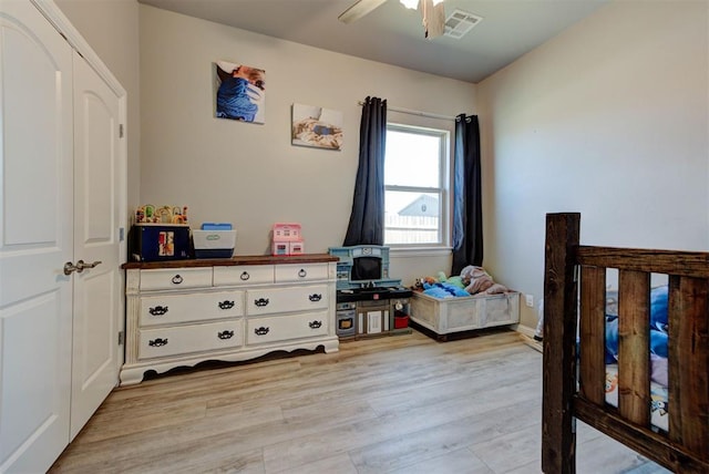 31352 Landrun Ave, Norman, OK 73072 - bedroom featuring light wood finished floors and ceiling fan