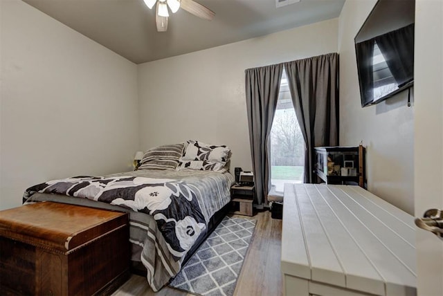 31352 Landrun Ave, Norman, OK 73072 - bedroom with wood finished floors and ceiling fan