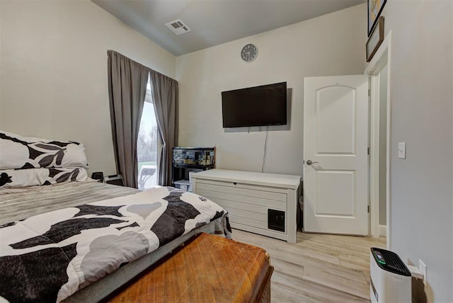 31352 Landrun Ave, Norman, OK 73072 - bedroom with light wood-style flooring