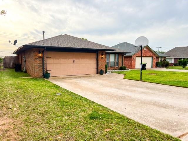 1189 N Blue Ridge Dr, Purcell, OK 73080 - ranch-style home featuring driveway, a front lawn, brick siding, a garage, and fence