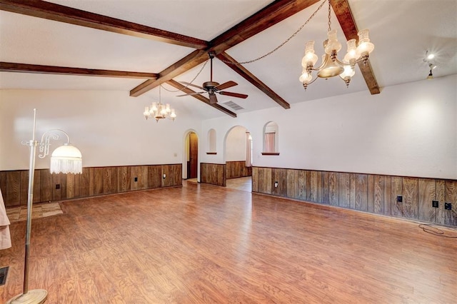 1809 W Aqua Clear Dr, Mustang, OK 73064 - interior space featuring visible vents, wood finished floors, wood walls, a wainscoted wall, and vaulted ceiling with beams