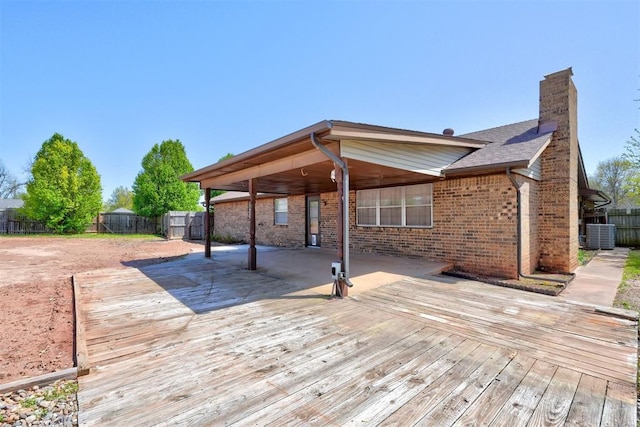 1809 W Aqua Clear Dr, Mustang, OK 73064 - wooden terrace featuring fence and central air condition unit