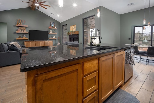 2040 County Road 1336, Blanchard, OK 73010 - kitchen with open floor plan, visible vents, a sink, and ceiling fan
