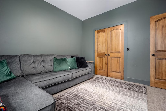 2040 County Road 1336, Blanchard, OK 73010 - carpeted living room featuring baseboards and vaulted ceiling