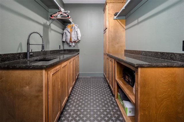 2040 County Road 1336, Blanchard, OK 73010 - bar with a sink and baseboards