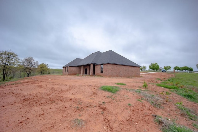 2040 County Road 1336, Blanchard, OK 73010 - exterior space featuring brick siding
