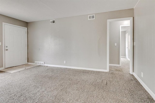 416 NW 81st St, Oklahoma City, OK 73114 - spare room featuring visible vents, baseboards, and carpet flooring