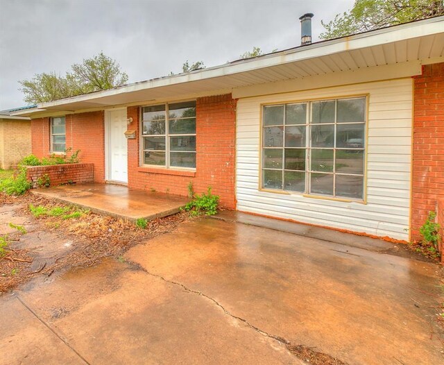 416 NW 81st St, Oklahoma City, OK 73114 - view of front facade with brick siding