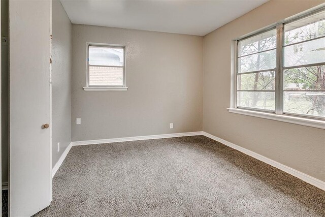 416 NW 81st St, Oklahoma City, OK 73114 - empty room with carpet flooring and baseboards