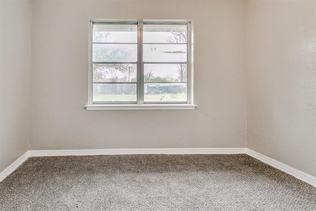 416 NW 81st St, Oklahoma City, OK 73114 - unfurnished room featuring carpet flooring and baseboards