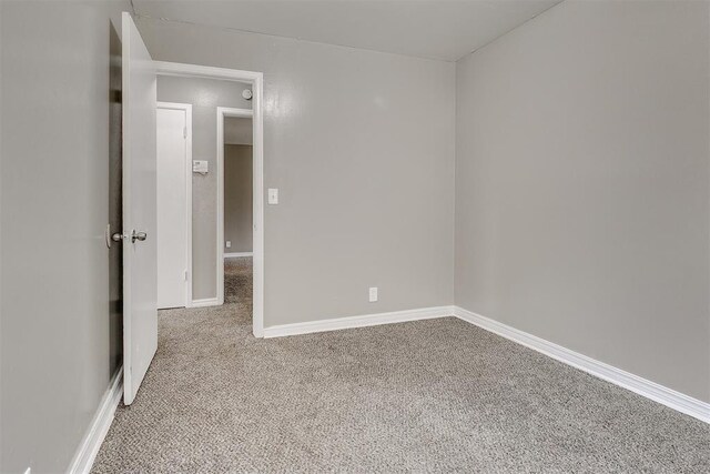 416 NW 81st St, Oklahoma City, OK 73114 - unfurnished room with baseboards and carpet floors