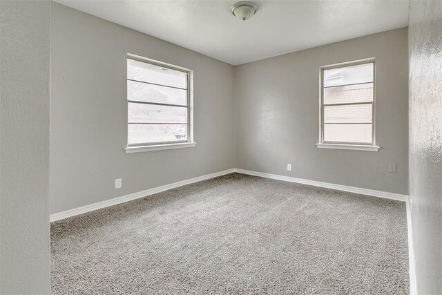 416 NW 81st St, Oklahoma City, OK 73114 - carpeted empty room with baseboards