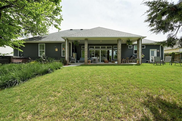 back of property featuring a patio, fence, and a lawn