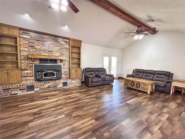 1016 Canyon Ridge Rd, Clinton, OK 73601 - living room featuring a textured ceiling, ceiling fan, vaulted ceiling with beams, and dark wood-type flooring