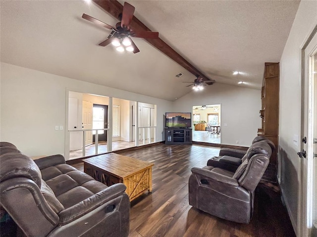 1016 Canyon Ridge Rd, Clinton, OK 73601 - living area with baseboards, lofted ceiling with beams, a ceiling fan, and wood finished floors