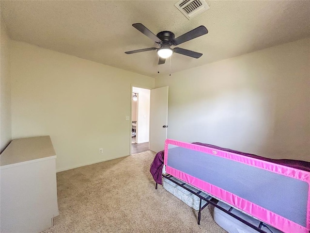 1016 Canyon Ridge Rd, Clinton, OK 73601 - bedroom featuring carpet, visible vents, ceiling fan, and baseboards