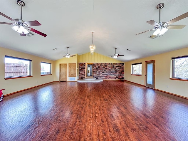1016 Canyon Ridge Rd, Clinton, OK 73601 - unfurnished living room featuring a fireplace with raised hearth, baseboards, vaulted ceiling, wood finished floors, and a ceiling fan