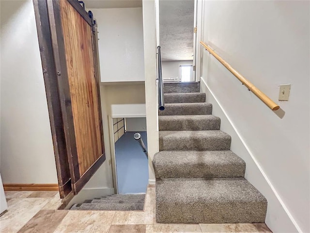 1016 Canyon Ridge Rd, Clinton, OK 73601 - staircase with a barn door