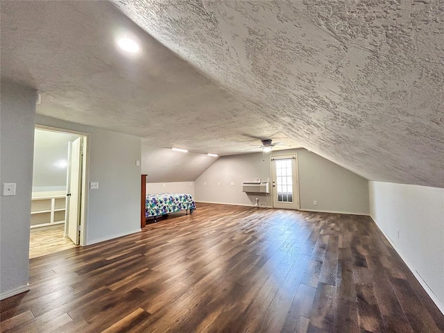 1016 Canyon Ridge Rd, Clinton, OK 73601 - bonus room featuring a ceiling fan, a textured ceiling, and wood-type flooring