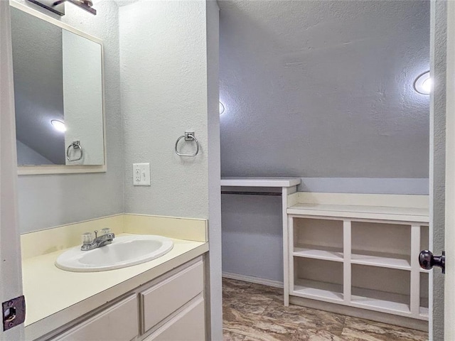 1016 Canyon Ridge Rd, Clinton, OK 73601 - bathroom with a textured wall and vanity
