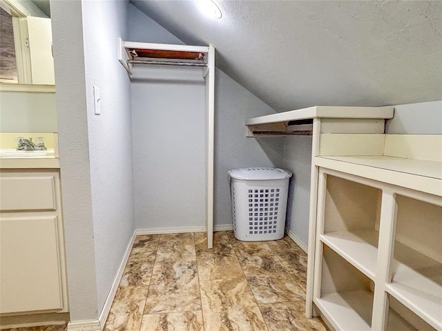 1016 Canyon Ridge Rd, Clinton, OK 73601 - spacious closet featuring a sink and vaulted ceiling