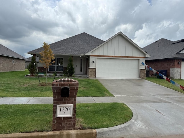 1220 SW 139th St, Oklahoma City, OK 73170 - single story home featuring board and batten siding, an attached garage, concrete driveway, roof with shingles, and a front yard