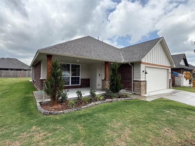 1220 SW 139th St, Oklahoma City, OK 73170 - view of front of property featuring an attached garage, a shingled roof, driveway, brick siding, and board and batten siding