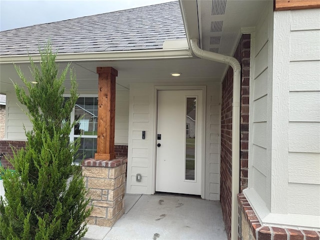 1220 SW 139th St, Oklahoma City, OK 73170 - entrance to property featuring roof with shingles and covered porch