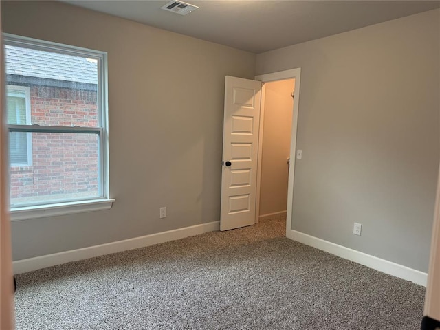 1220 SW 139th St, Oklahoma City, OK 73170 - empty room with carpet and plenty of natural light