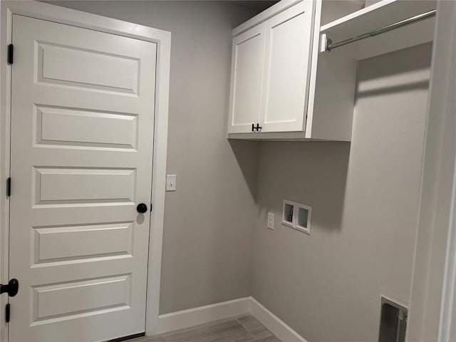1220 SW 139th St, Oklahoma City, OK 73170 - laundry area with cabinet space and washer hookup